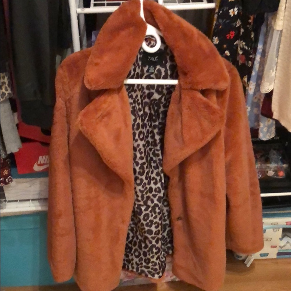 Faux fur orange coat. Leopard lining. Worn twice